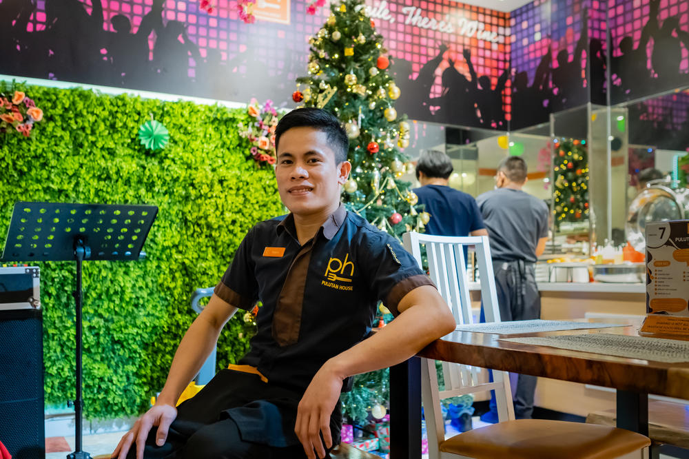 Robert Monsale works at a Philippine restaurant on Rigga Street. He hasn't had Christmas off since coming to Dubai three years ago.