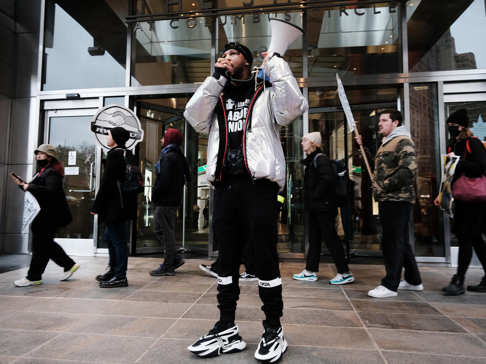 Amazon Labor Union President Chris Smalls speaks at a protest outside of a New York event featuring Amazon CEO Andy Jassy. The independent ALU won a union election at a warehouse in Staten Island in April, but has been unable to win other union elections.