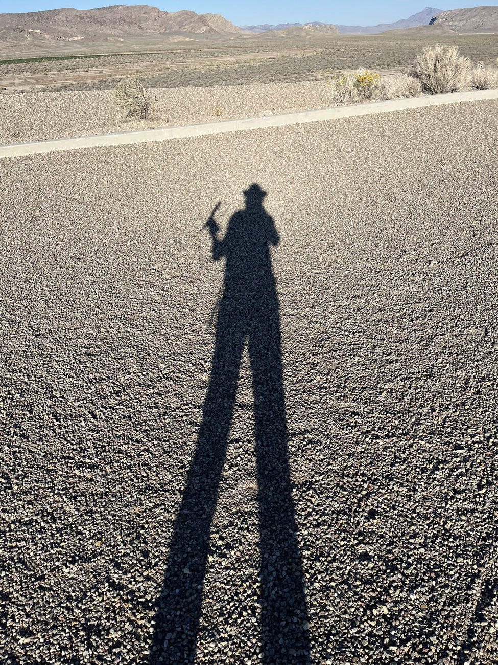 NPR reporter Chloe Veltman takes stock of the length of her shadow while wandering around <em>City</em>.