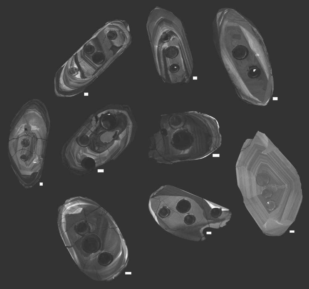 Zircons studied by the research team, photographed using cathodoluminescence, a technique that allowed the team to visualize the interiors of the crystals using a specialized scanning electron microscope. Dark circles on the zircons are the cavities left by the laser that was used to analyze the age and chemistry of the zircons.