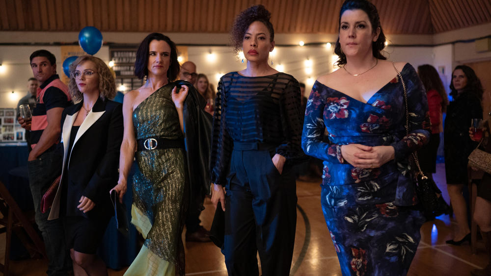 Christina Ricci as Misty, Juliette Lewis as Natalie, Tawny Cypress as Taissa and Melanie Lynskey as Shauna in <em>Yellowjackets</em>.