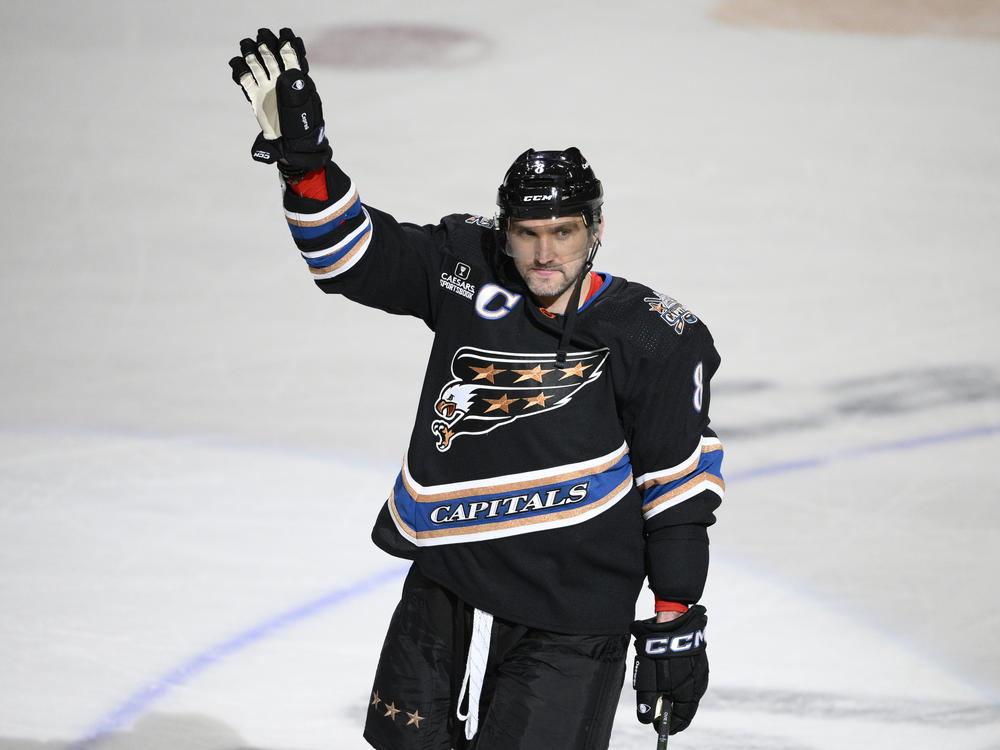 Washington Capitals left wing Alex Ovechkin waves as he celebrates his third-period goal against the Winnipeg Jets on Friday in Washington. It was Ovechkin's 802nd NHL goal.