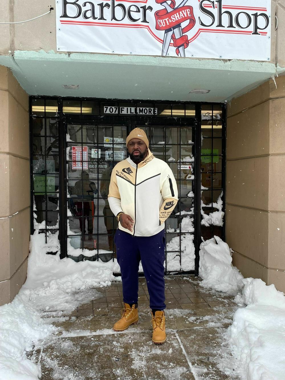 Craig Elston opened his barber shop in Buffalo to residents who lost power or were stranded by a major snow storm last week.