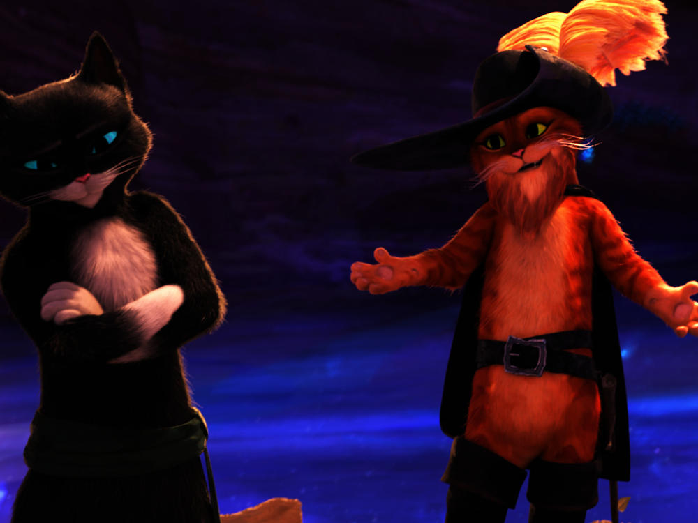 This image released by DreamWorks Animation shows the characters Kitty Softpaws, voiced by Salma Hayek Pinault, left, and Puss in Boots, voiced by Antonio Banderas, from the animated film <em>Puss in Boots: The Last Wish</em> by director Joel Crawford.