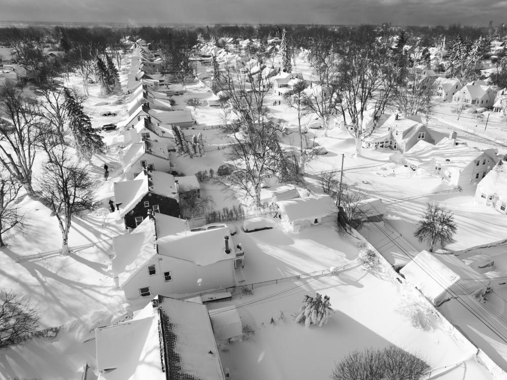 Snow blankets a neighborhood, on Sunday in Cheektowaga, N.Y.