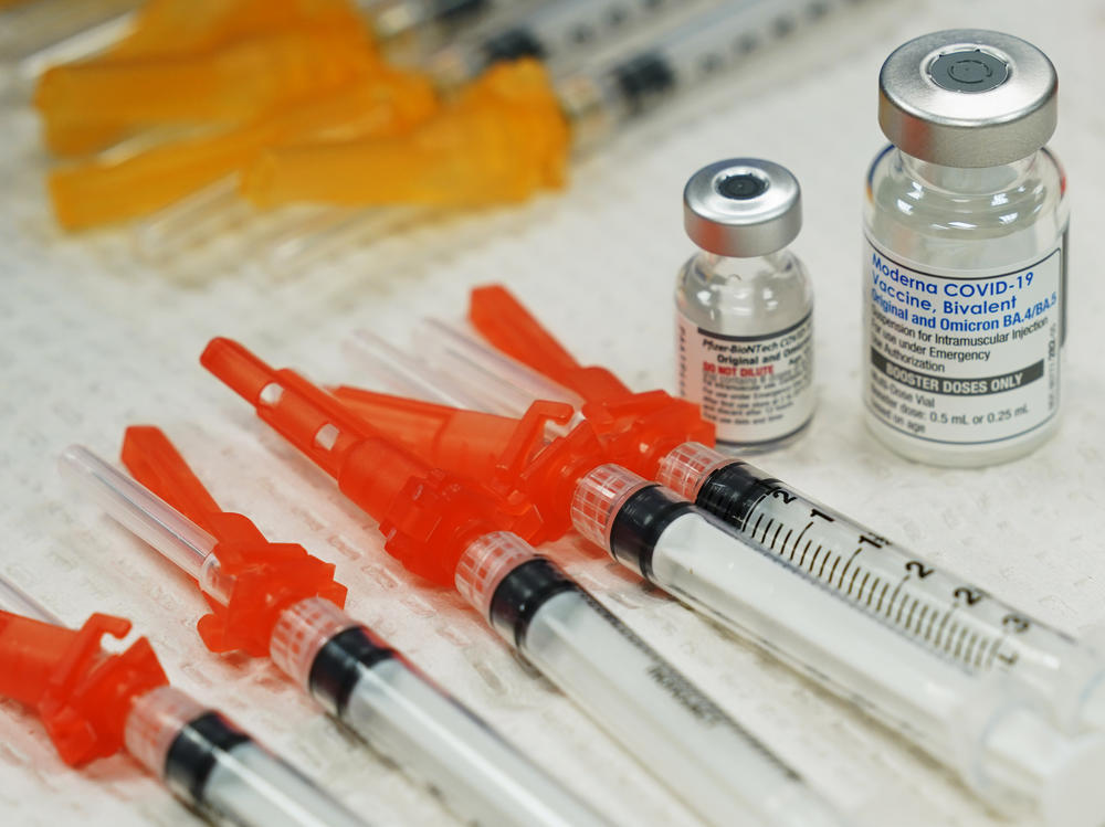 Bivalent COVID-19 vaccines are readied for use at a clinic in Richmond, Va., Nov. 2022. Just 15% of eligible Americans have gotten the most recent booster shot, according to the CDC.