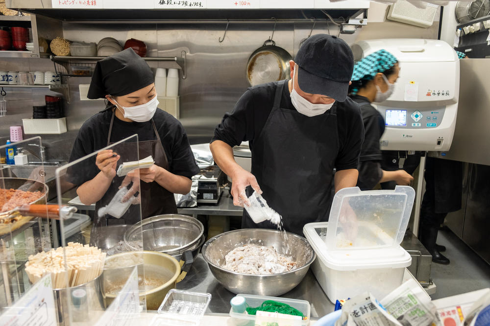 Onigiri Bongo restaurant staff prepare ingredients for rice balls ahead of lunchtime.