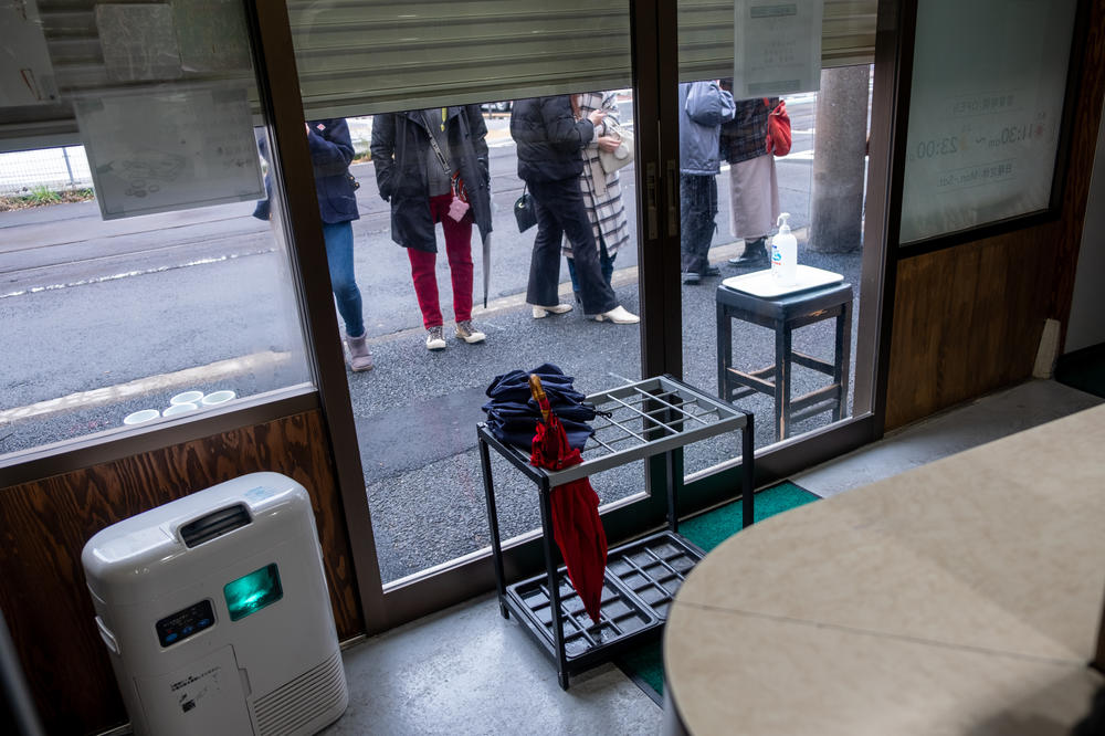 The front of a line of people stretching down the block, awaiting the 11:30 a.m. opening of Onigiri Bongo, a nine-seat restaurant.