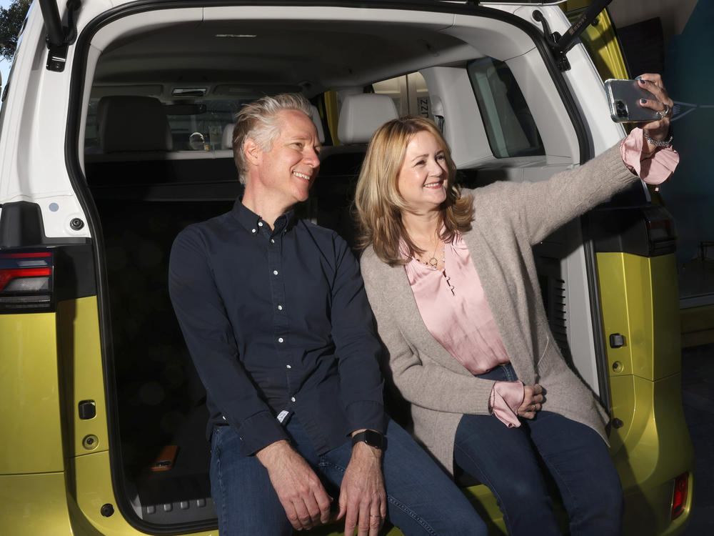 Scott Keogh, president and CEO of Volkswagen Group of America, and Scotty Reiss, founder and CEO of a Girl's Guide to Cars, attend SXSW at ID. Buzz Stop on March 12 in Austin, Texas. The car is another entry into the growing EV field.