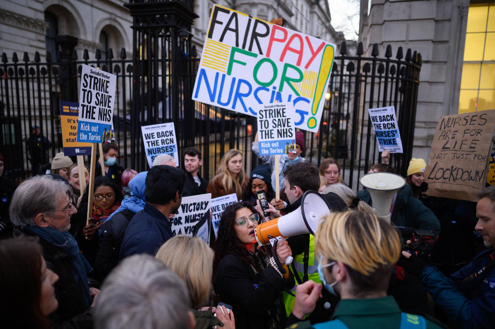 National Health Service workers and supporters gather outside Downing Street to protest during the second day of strike action by NHS nurses on Dec. 20 in London. For the first time in its history, the Royal College of Nursing called its members out on strike in England, Wales and Northern Ireland, over pay and conditions.