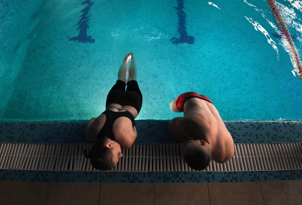 Misha and Ira take part in therapeutic swimming activity at Moldova pool in Truskavets, Ukraine.