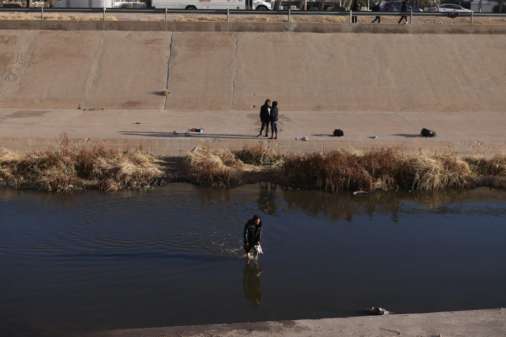 Migrant crosses the Rio Grande River into the United States in El Paso, Texas, U.S., Dec. 30, 2022.