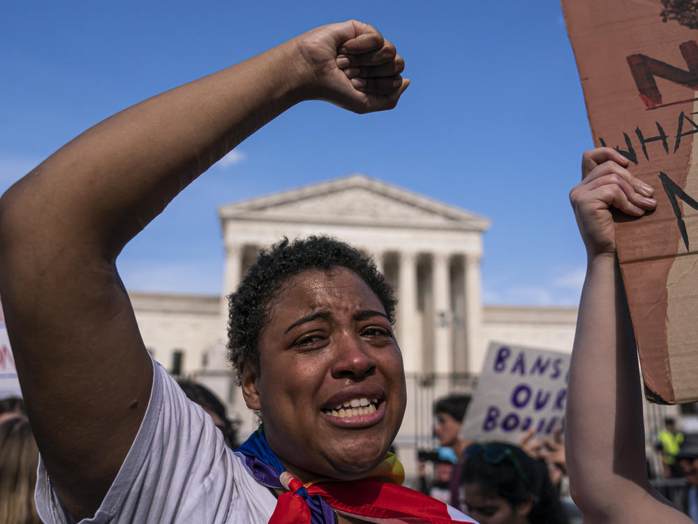 Abortion rights activist Sierra Frey cries while protesting in front of the U.S. Supreme Court on June 26, after the court overturned a federal right to an abortion. The landmark decision was one of the top political stories of 2022.