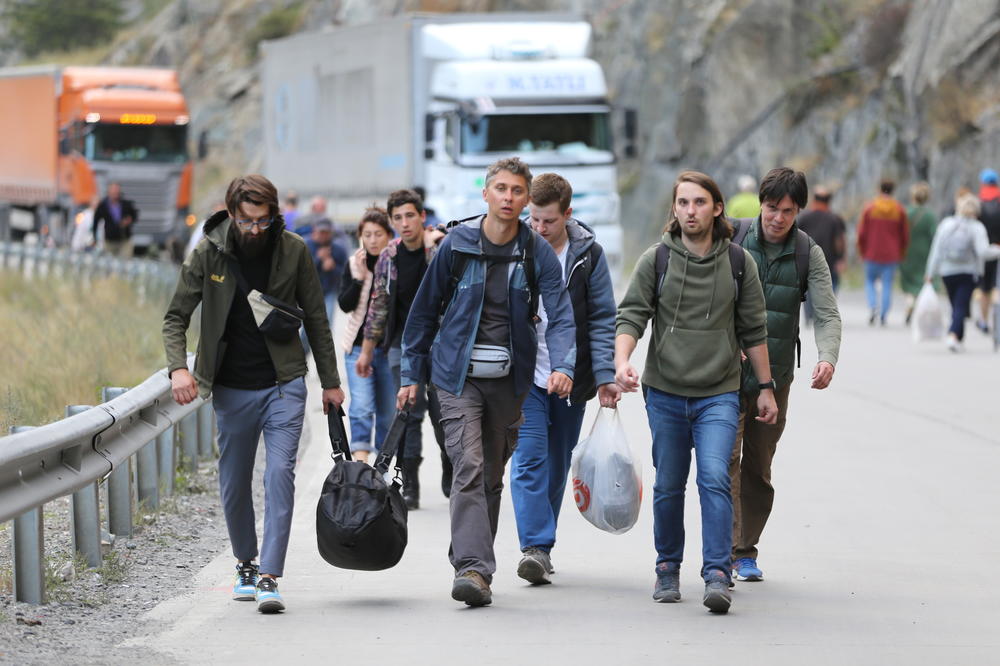 Russians queue to leave their country to avoid a military mobilization, at the Kazbegi border crossing in Stepantsminda, Georgia, on Sept. 28. The number of Russian citizens entering Georgia increased after Vladimir Putin's partial mobilization order.