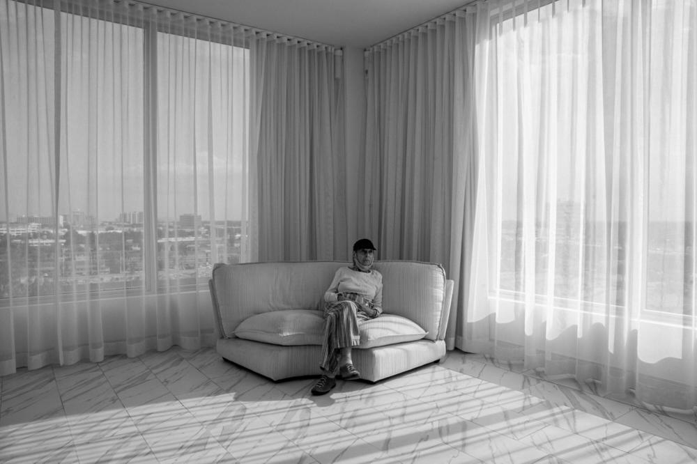 Audrey waits for the movers to bring in her furniture to her new apartment in an assisted living facility, Aventura, Miami, Fla., May, 2020.