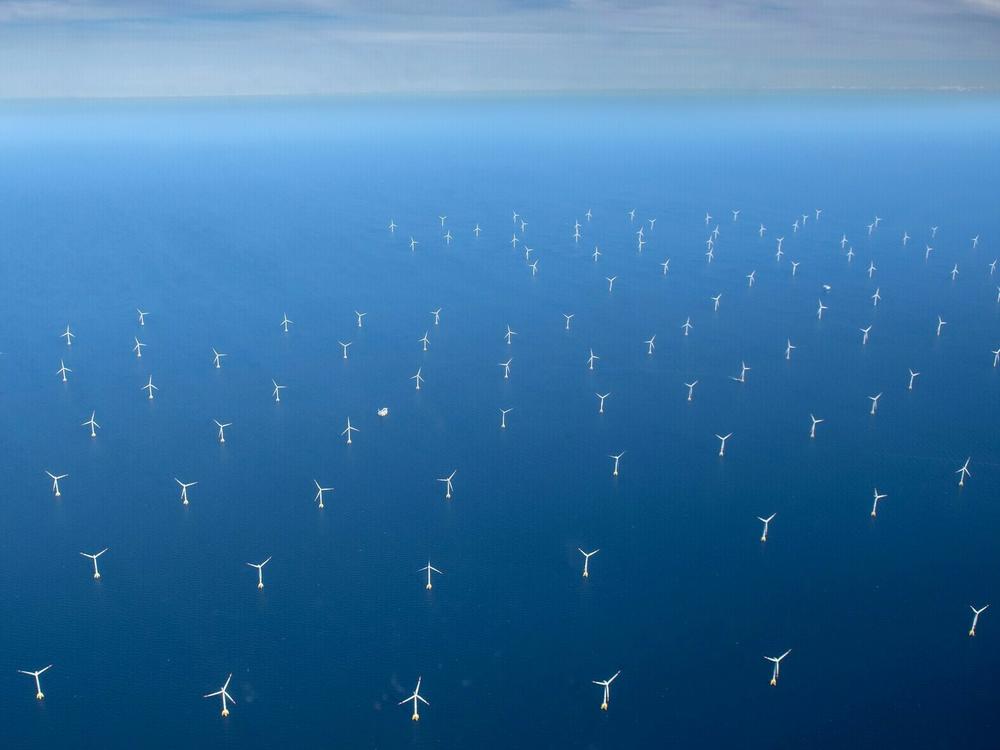 This aerial photograph taken on June 16, 2022, shows a wind turbine farm in the Baltic Sea, northeast of Rugen Island in Germany.