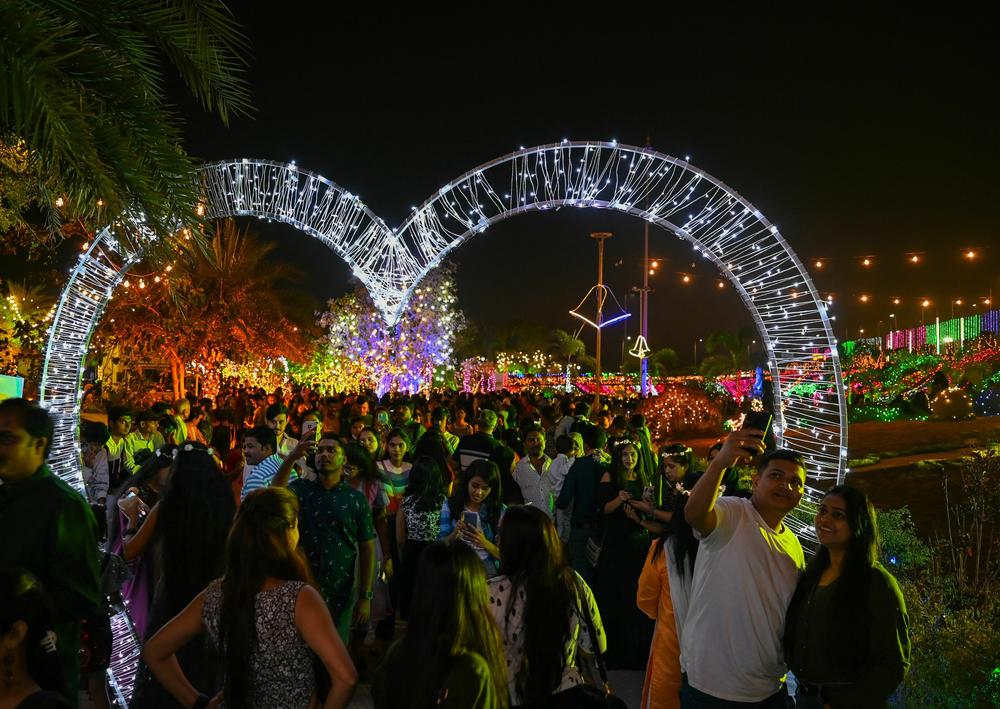 People celebrate at the sea promenade in Mumbai, India.