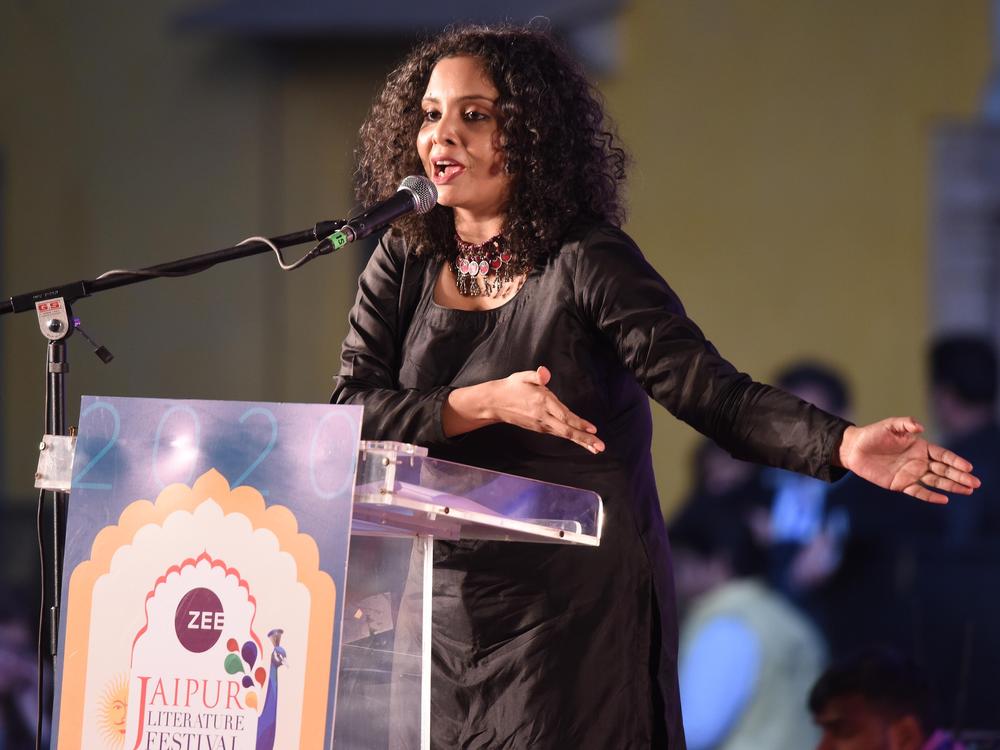 Indian journalist Rana Ayyub speaks during the launch of her self published book 'Gujarat Files' in New Delhi in May 2016. On March 29, 2022, Ayyub was prevented from flying to Europe to speak about online violence on female journalists.