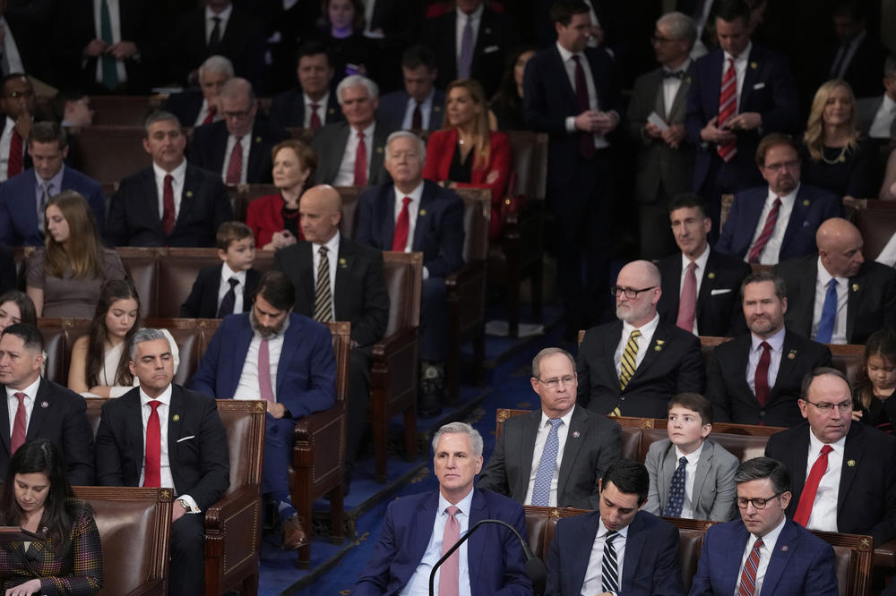 Rep. Kevin McCarthy of California listens as votes are cast for next speaker of the House during the opening day of the 118th Congress at the U.S. Capitol.