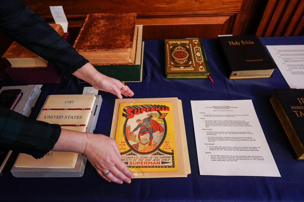 A first edition Superman comic from 1939 is placed with copies of the Constitution and a variety of holy books for use in the swearing-in ceremonies of new House members.
