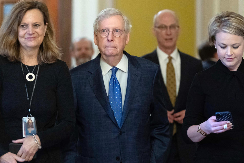 Senate Minority Leader Mitch McConnell, R-Ky., walks to his office as he talks to reporters on Capitol Hill on Jan. 3. McConnell became longest serving leader in Senate history on Tuesday.