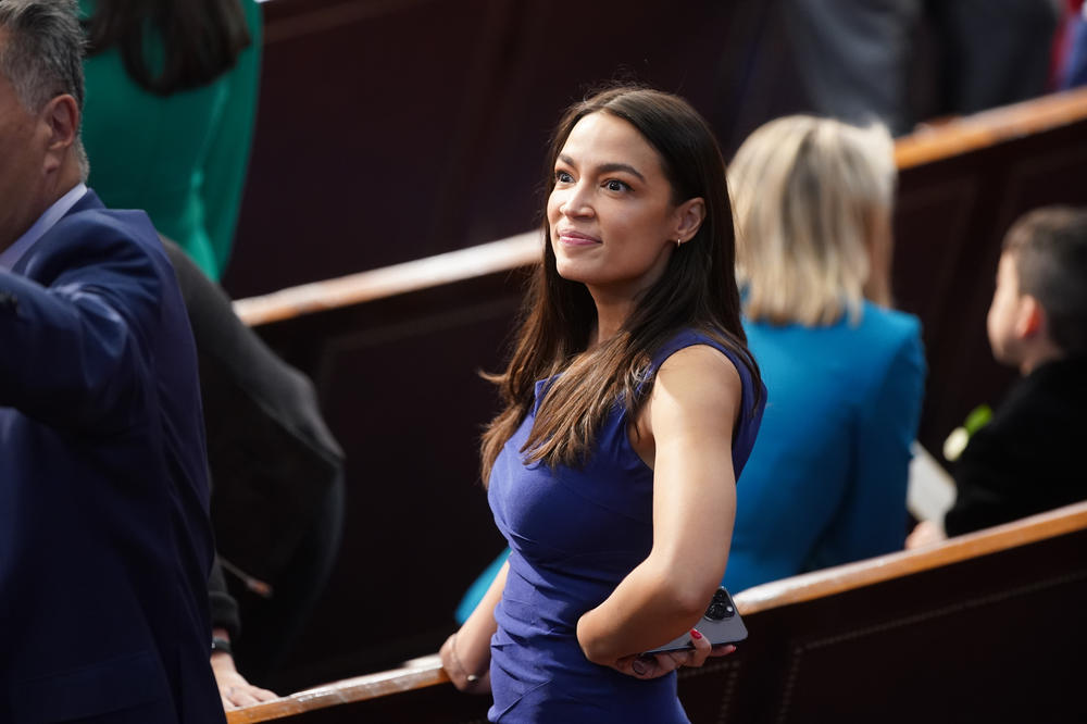 Rep. Alexandria Ocasio-Cortez, a Democrat from New York, attends the first session of the 118th Congress in the Capitol's House chamber.
