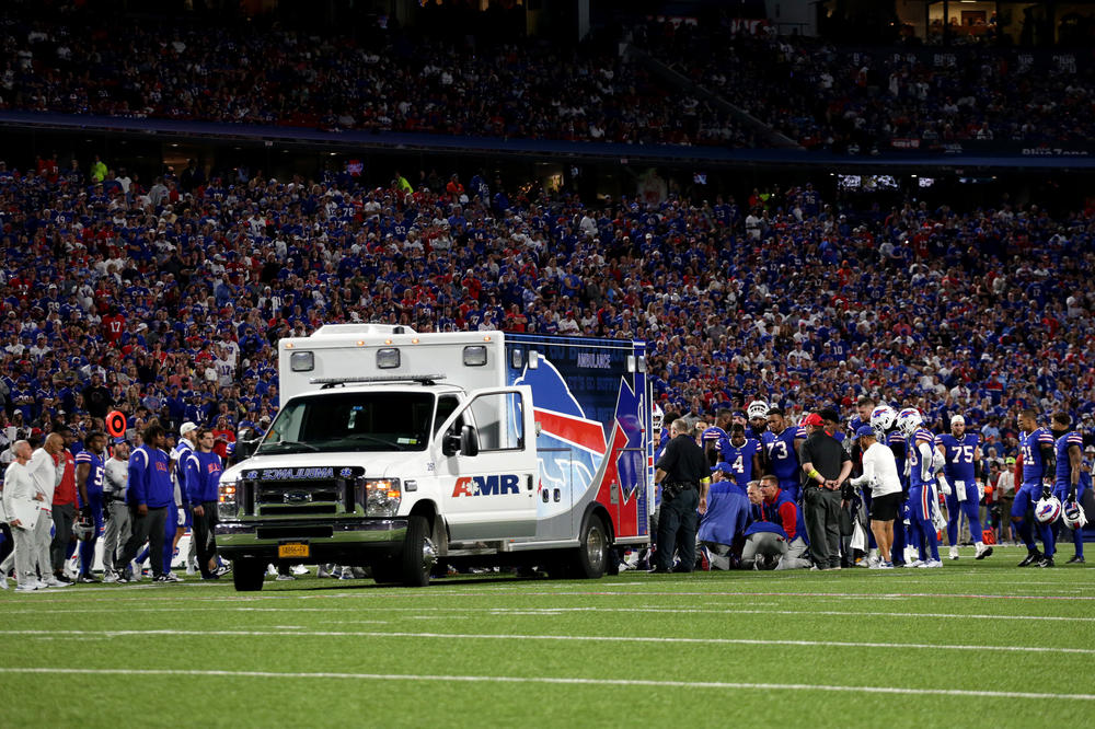 Bills players look on as their teammate Dane Jackson, a longtime friend of Damar Hamlin's, receives medical attention after an injury during a game in September.