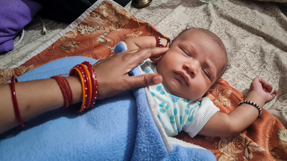 Vehant Singh, the son of 24-year-old Naina Agrahari and 27-year-old Sumit Chauhan, was born in Mumbai on Nov. 9. The photo was taken when he was 1 month old. He is part of a wave of newborns who will lift India's population past China. And he is part of a new generation in India with far more opportunities than past generations.