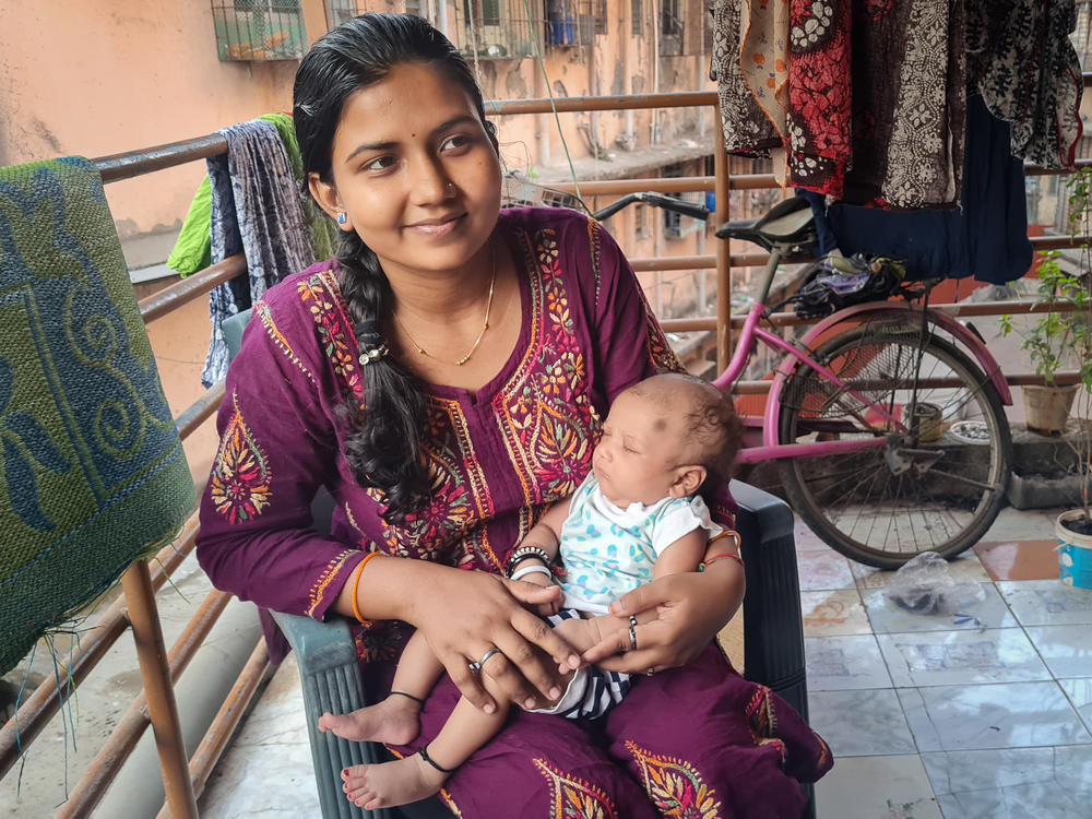 Naina Agrahari, 24, with her newborn son, Vehant Singh, at her mother's home in northern Mumbai.