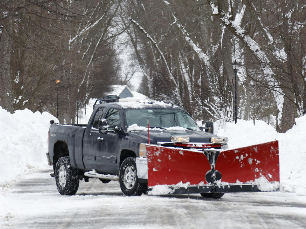 A plow clears snow after a winter storm rolled through Western New York Tuesday, Dec. 27, 2022, in Amherst, N.Y.