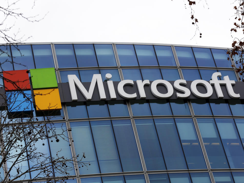 The Microsoft logo is pictured outside the headquarters in Paris, Jan. 8, 2021. A group of video game testers is forming Microsoft's first labor union in the U.S. and the largest in the video game industry. Communications Workers of America said Tuesday, Jan. 3, 2023, that about 300 quality assurance workers at Microsoft video game subsidiary ZeniMax Studios have voted to join the union.