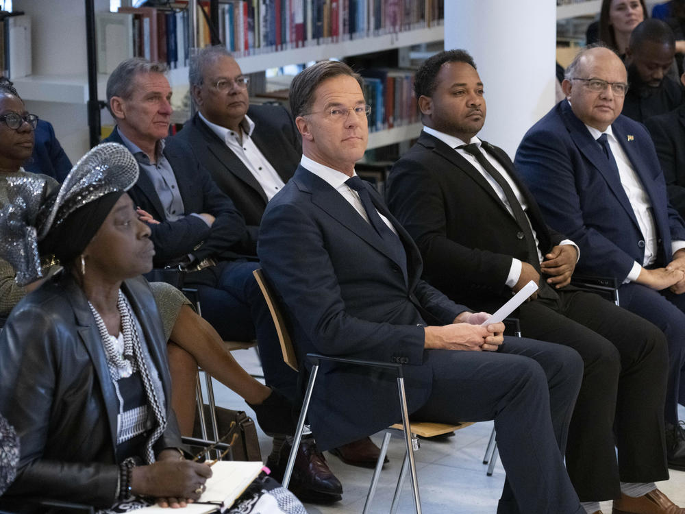 Dutch Prime Minister Mark Rutte, center, apologized on behalf of his government for the Netherlands' historical role in slavery and the slave trade.