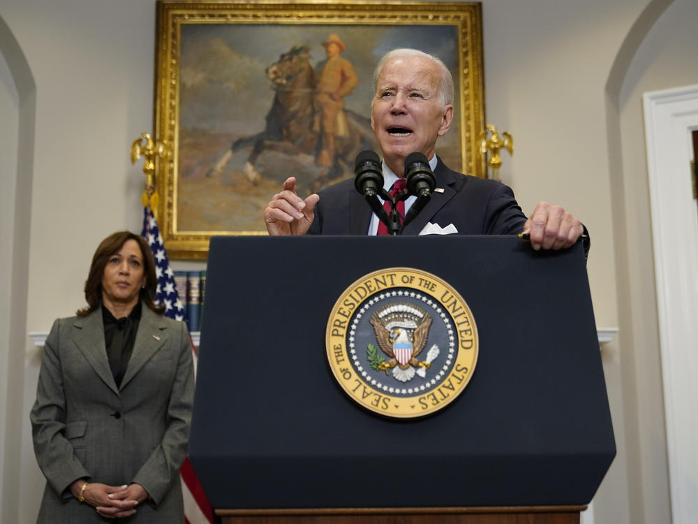 President Joe Biden speaks about border security in the Roosevelt Room of the White House, on Thursday. Vice President Kamala Harris stands at left. Biden plans to visit the southern U.S. border next week.