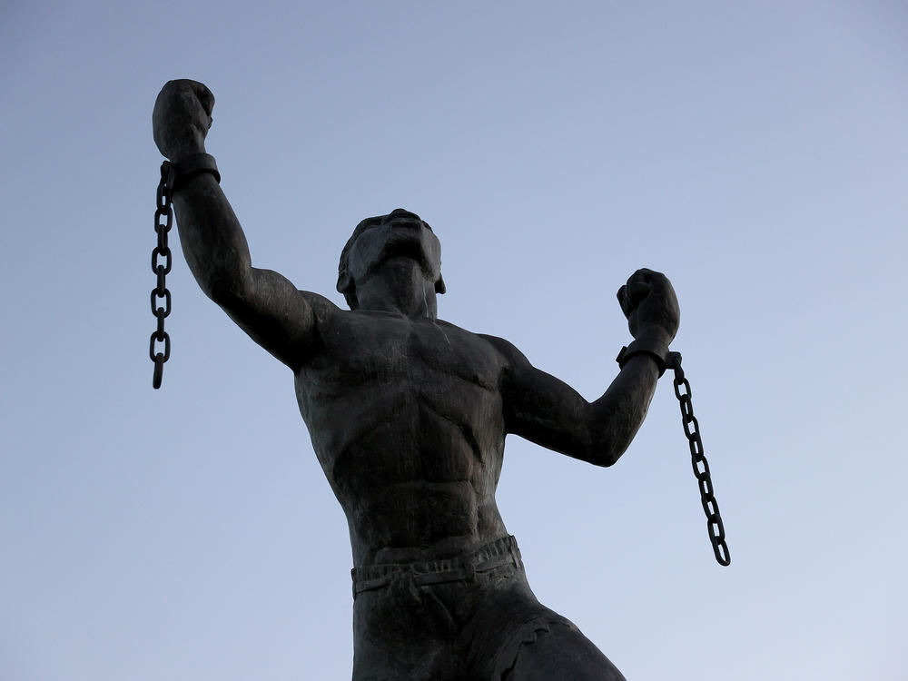 The Emancipation Statue symbolizing the breaking of the chains of slavery at the moment of emancipation is shown on November 16, 2021 in Bridgetown, Barbados.