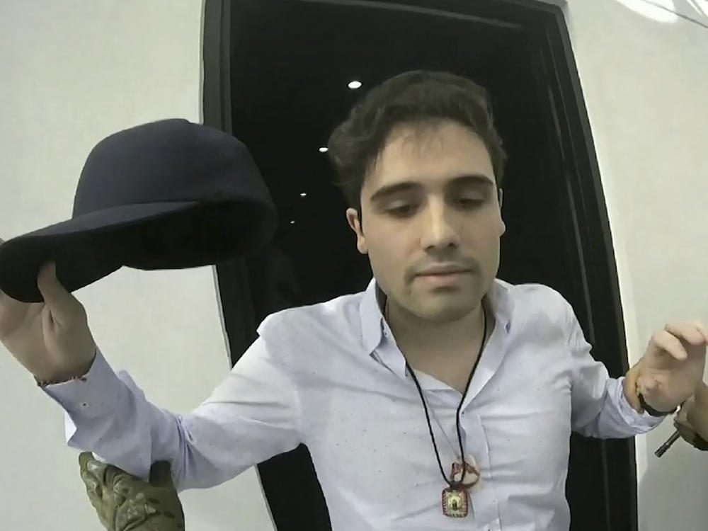 This Oct. 17, 2019 frame grab from video provided by the Mexican government shows Ovidio Guzman Lopez at the moment of his detention, in Culiacan, Mexico. Mexican security forces were forced to release the son of Sinaloa cartel leader Joaquin 