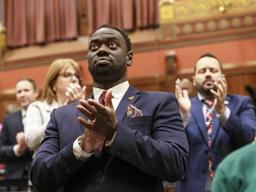 State Rep. Quentin Williams, D-Middletown, applauds during Connecticut Gov. Ned Lamont's state of the state address, Wednesday, Jan. 4, 2023, in Hartford, Conn. Williams was killed overnight in a wrong-way highway crash after having attended the governor's inaugural ball hours and after having been sworn in to a third term, House Democratic leaders said Thursday.