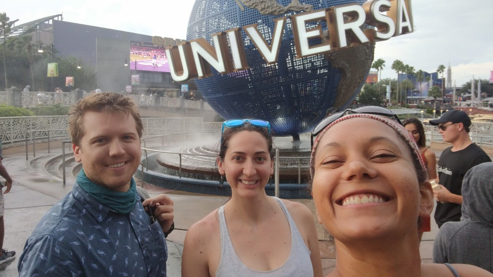 Ashley (center) with her friends Cliff (left) and Amanda (right) at Universal Studios. Ashley says Amanda helped her find a welcoming queer community in Colorado.