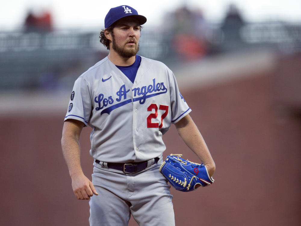 Los Angeles Dodgers starting pitcher Trevor Bauer pauses during a game against the San Francisco Giants on May 21, 2021, in San Francisco. The Dodgers are cutting ties with pitcher after his suspension was reduced two weeks ago.