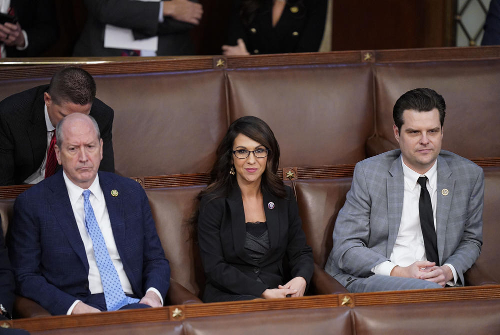 Reps.-elect Dan Bishop (R-NC), Lauren Boebert (R-Colo.), and Matt Gaetz (R-Fla.) watch floor proceedings as the search for speaker continued for a fourth day.