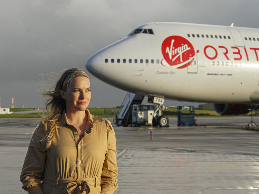 Melissa Thorpe, head of Spaceport Cornwall, in front of Cosmic Girl.
