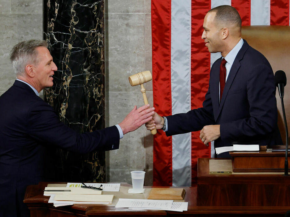 Speaker of the House Kevin McCarthy, R-Calif., receives the gavel from House Democratic leader Hakeem Jeffries, D-N.Y., after McCarthy was elected speaker in the House Chamber at the U.S. Capitol early Saturday morning.