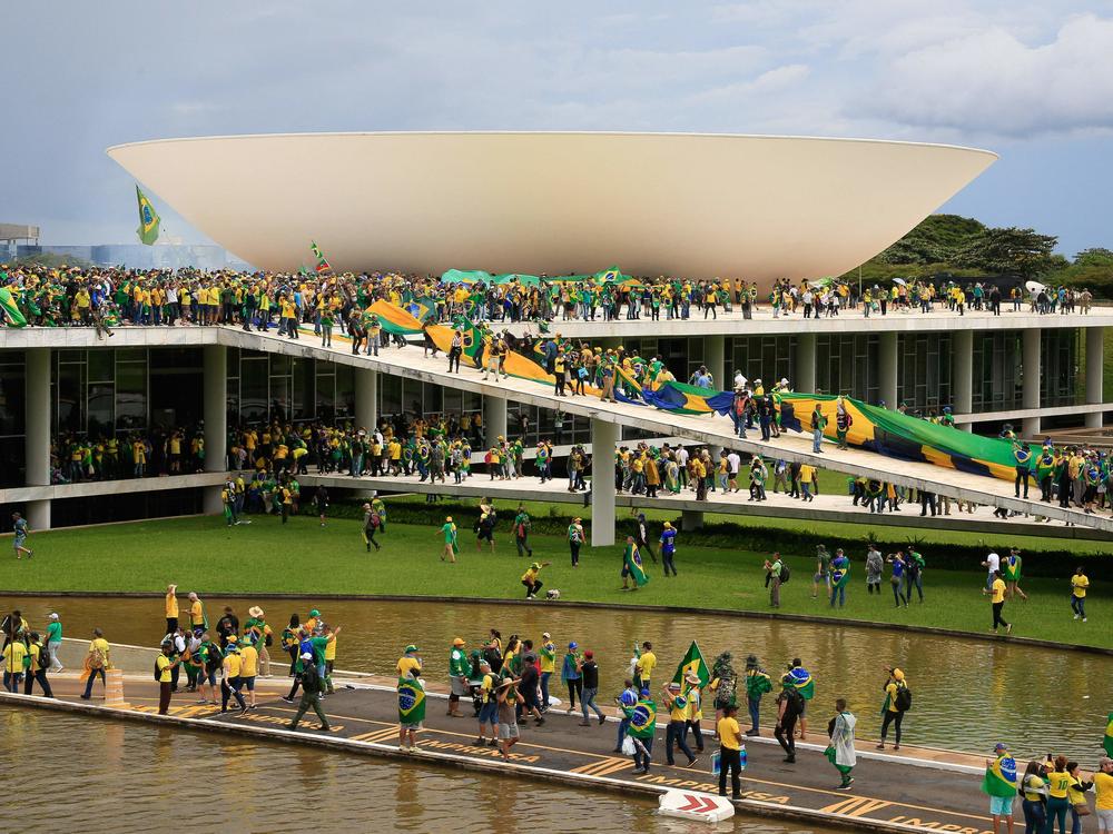 Supporters of Brazilian former President Jair Bolsonaro invade the National Congress in Brasilia on Sunday.