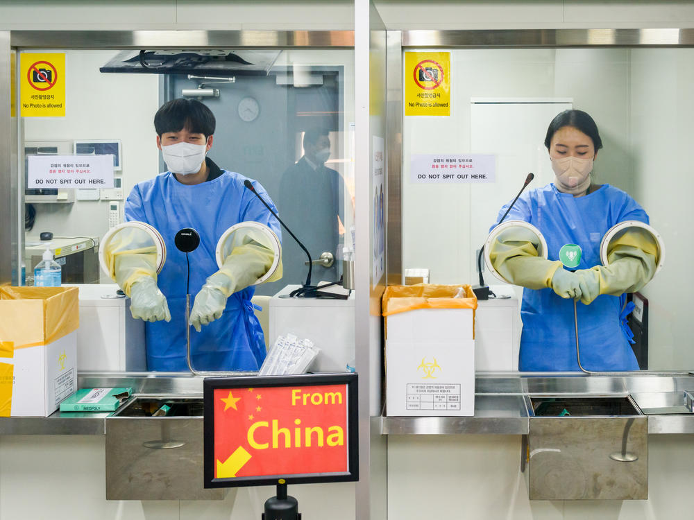 It's COVID testing time at Incheon International Airport, west of Seoul, South Korea. Arrivals from China must now submit to a PCR test.