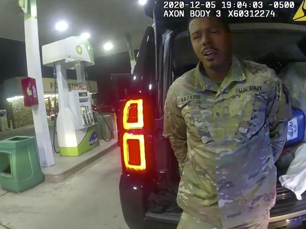 In this image made from Windsor, Va., Police video, a police officer speaks with Caron Nazario during a traffic stop, Dec. 20, 2020, in Windsor, Va.