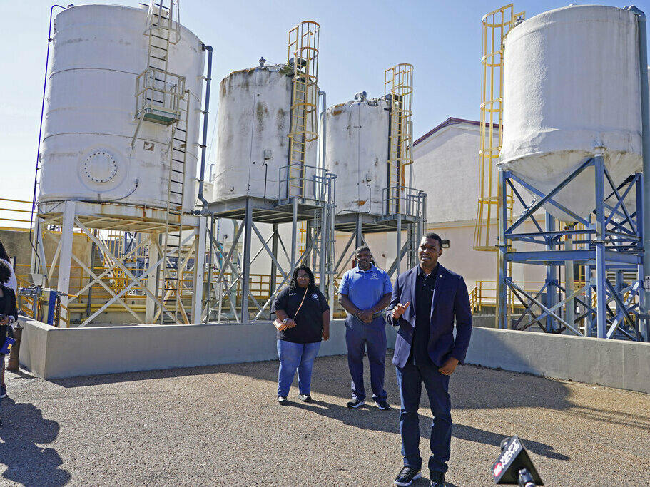 EPA Administrator Michael Regan, right, speaks to reporters in November 2021 at the O.B. Curtis Water Treatment Plant, a Ridgeland, Miss.-based facility near Jackson, Miss., about longstanding water issues that have plagued the city.