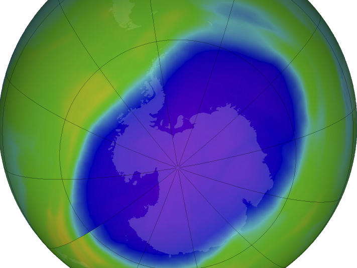 In this false-color image, the blue and purple show the hole in Earth's protective ozone layer over Antarctica on Oct. 5. Earth's ozone layer is slowly but noticeably healing.