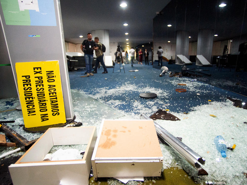Damage is seen at Brazil's Congress one day after supporters of former President Jair Bolsonaro stormed government buildings in Brasília. The attack was planned by far-right groups on social media, according to Brazilian media and analysts.