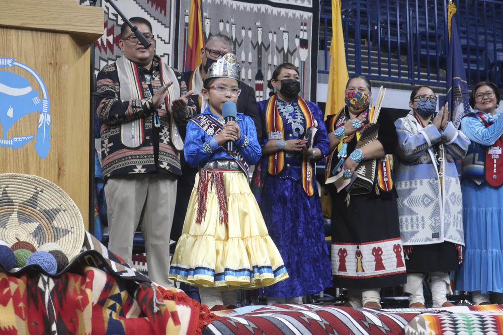 Miss Ganado Primary Princess Jewels E. Jones recites the pledge of allegiance in Navajo during the tribal inauguration.