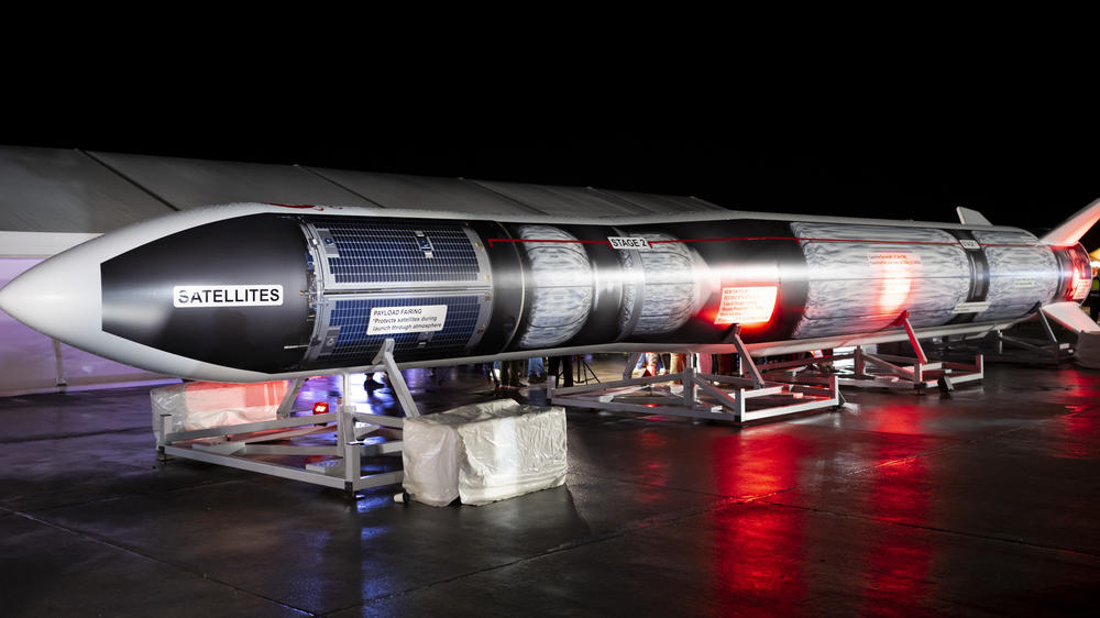 A model of the LauncherOne rocket is seen at the Cornwall launching area in Newquay, U.K., showing the satellite payload in the rocket's nose.
