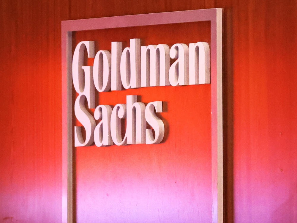 The Goldman Sachs logo is seen at the New York Stock Exchange in New York City on Sept. 13, 2022. Goldman is laying off up to 3,200 employees as it faces a more challenging business environment.